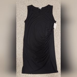 NWOT BLACK dressy dress with gathering on one side for a slimming effect.